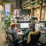 Two people working at desk