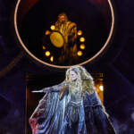 The White Witch holds out her wand in combat. The Lion, The Witch and The Wardrobe West End Production photograph.