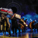 Members of the cast as a train. The Lion, The Witch and The Wardrobe West End Production photograph.