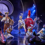 Father Christmas arrives with his reindeer. The Lion, The Witch and The Wardrobe West End Production photograph.